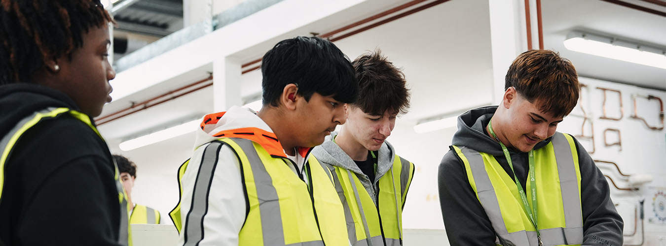 Students in plumbing workshop