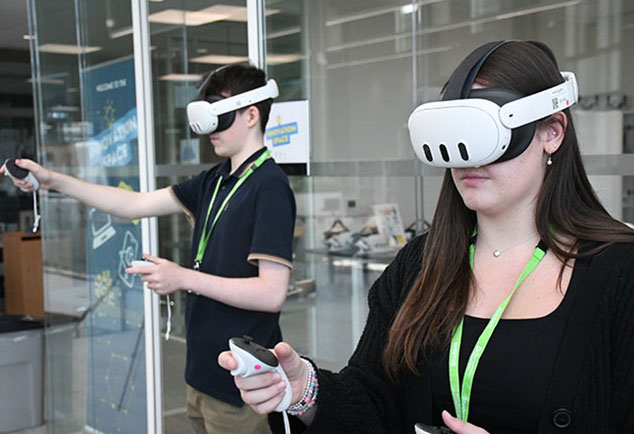 Two students using VR headsets